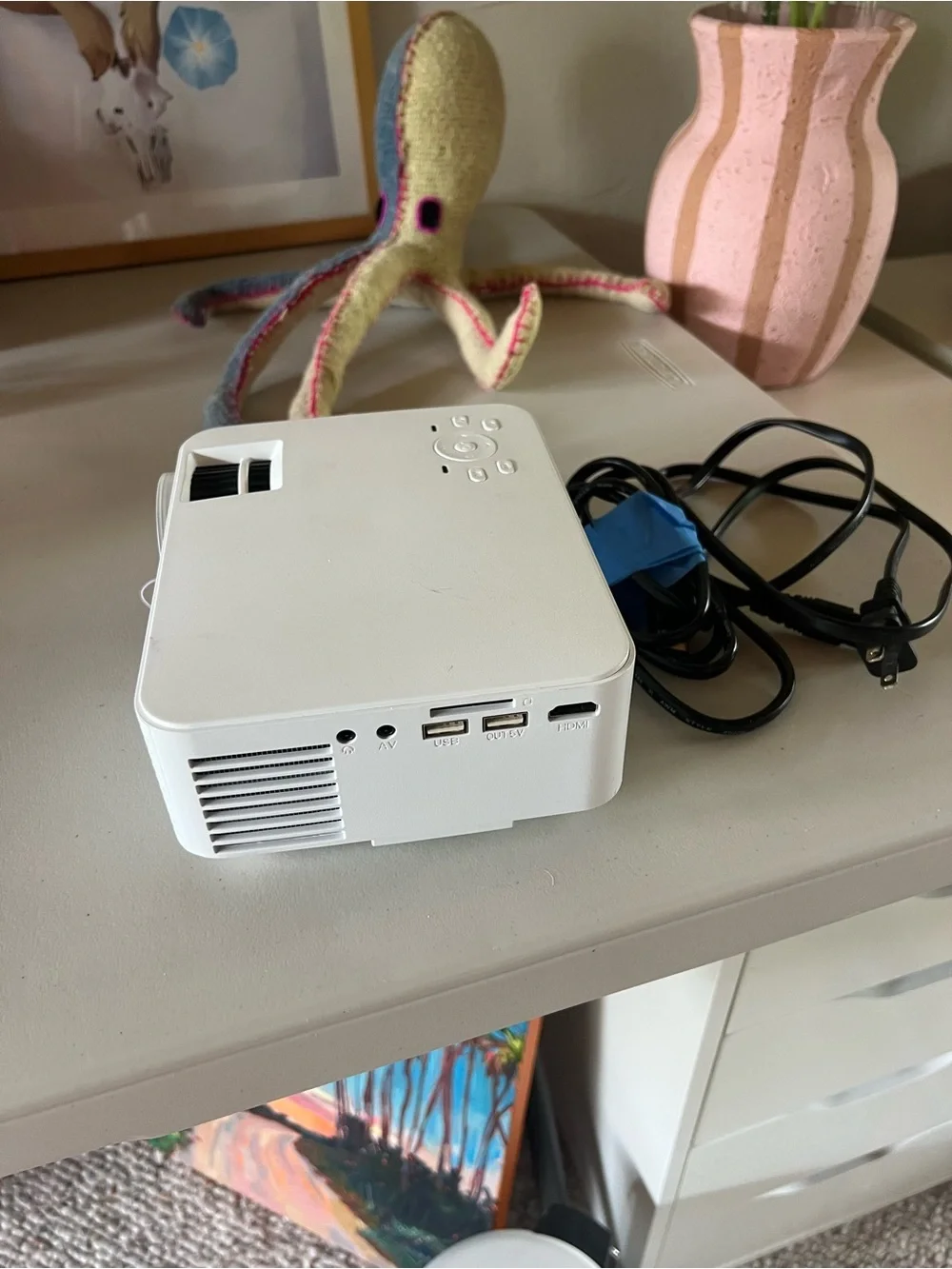 HOMP0W White Portable Mini Projector - Compact LED Home Theater